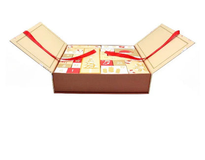 Open gift box with a red ribbon on a white background
