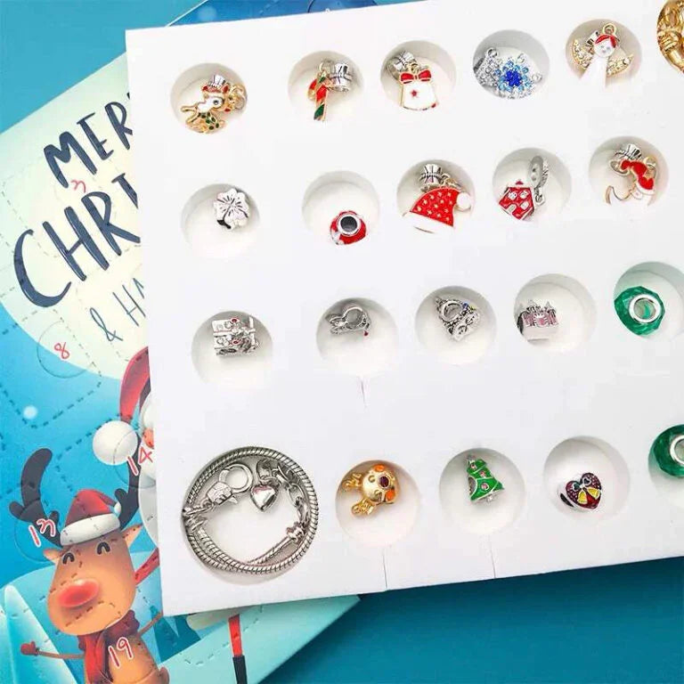 Holiday jewelry collection displayed alongside Merry Christmas card