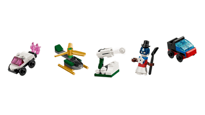Five small toy building-block vehicles and a snowman figure