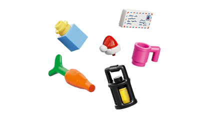 Set of colorful toy items including a carrot, lock, and other small objects 